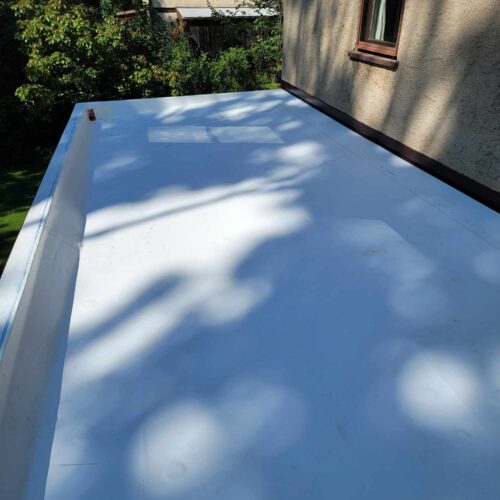 Flat roof repair on a modern structure