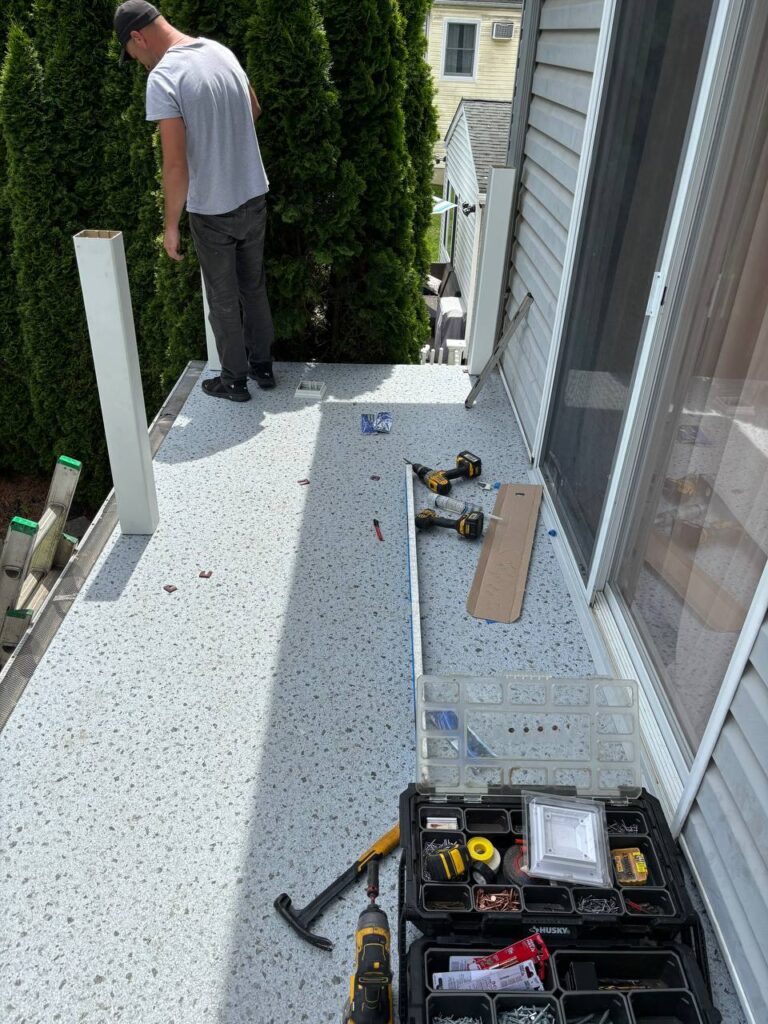 Smooth light gray floor with a texture of small pebbles
