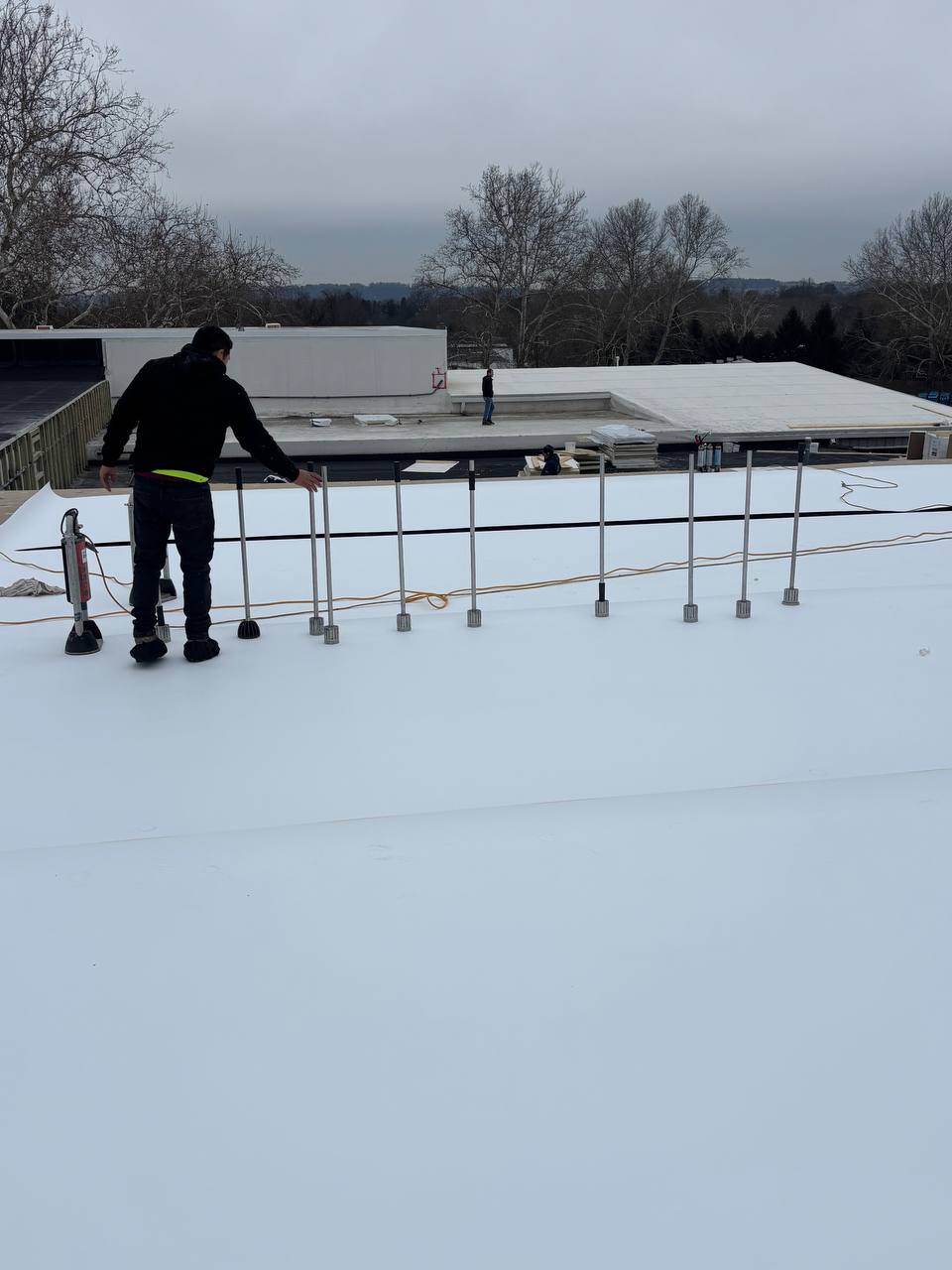 Mechanically attached Flat Roof System