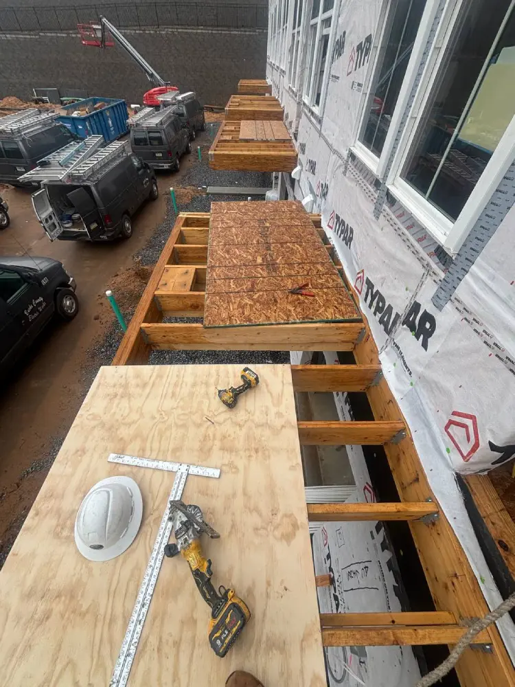 installing new plywood decking panels