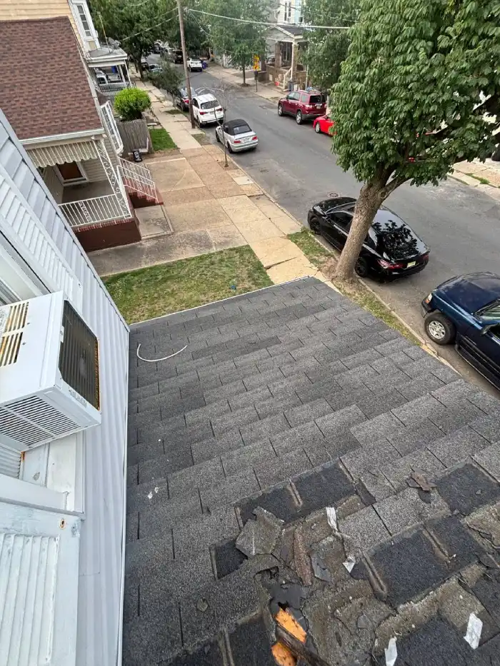 Damaged shingle roof