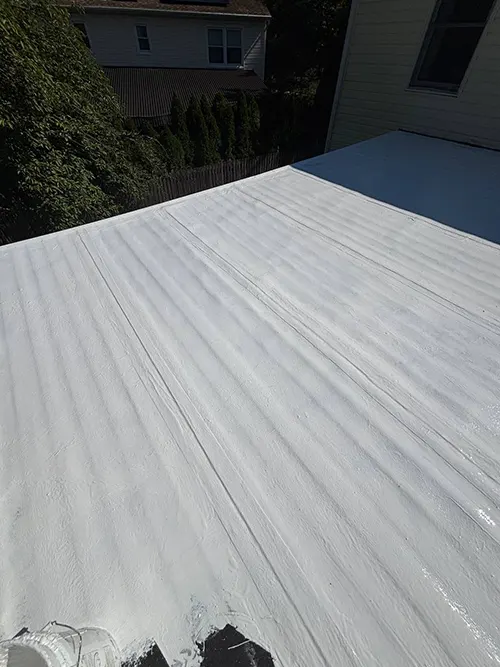 White silicone roof coating