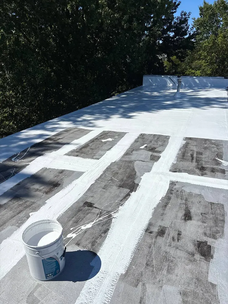 White silicone roof coating