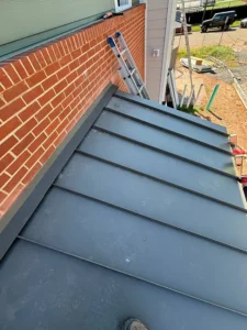 Standing seam entrance awning