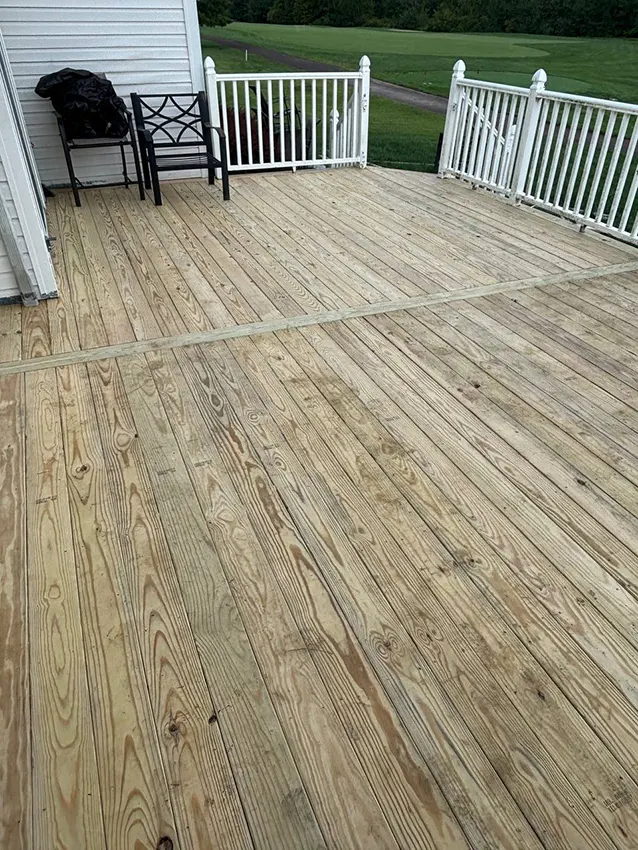 Inspecting exposed wooden deck framing