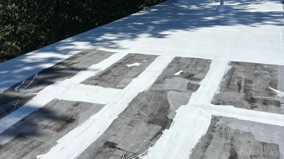 White silicone roof coating